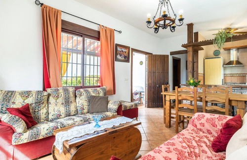 Sedella House | Spend the vacation in this inviting cottage in a beautiful location.