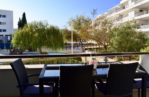Telheiro Apartment | Splendid apartment with covered terrace, shared pool, WIFI, Air-Cond
