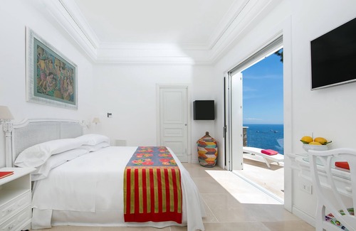 Marina del Cantone Villa | Splendid luxury VILLA IBISCUS overlooking the sea with infinity pool