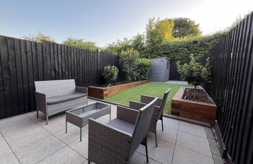 Stevenage House | Spotless Two-Bedroom Home with Garden and Parking