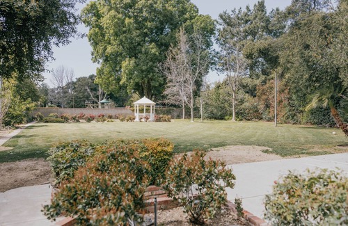 Newhall House | Sprawling 4-Bedroom Tudor Retreat with Spacious Backyard Oasis