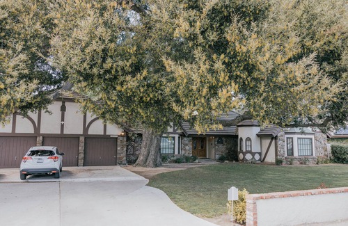 Newhall House | Sprawling 4-Bedroom Tudor Retreat with Spacious Backyard Oasis