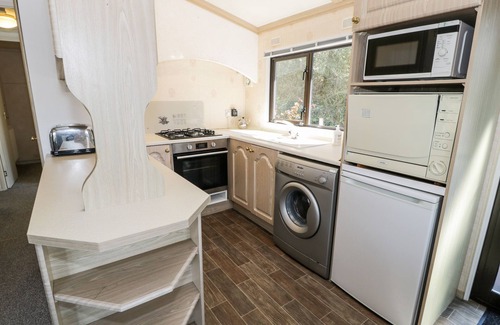 Rhyd-y-foel Cottage | SPRINGTIME LODGE, pet friendly, with a garden in Rhyd-Y-Foel