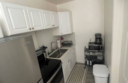 Palm Beach Shores Cottage | Standalone 1/1 Apartment Across From Beach and Next to Pool
