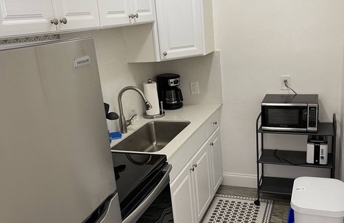 Palm Beach Shores Cottage | Standalone 1/1 Apartment Across From Beach and Next to Pool