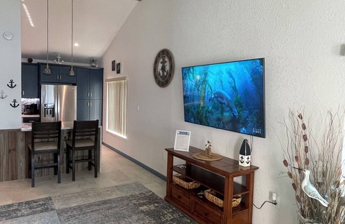 Cocoa Beach Condo | Stay and kayak with dolphins manatees