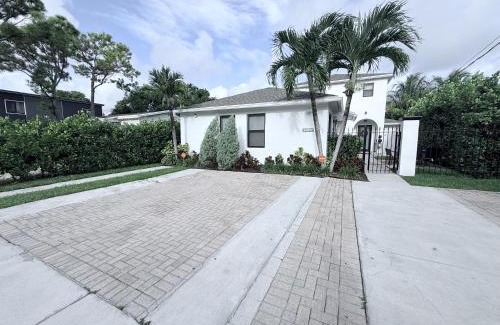 Coral Way House | Stay Central: Relax in Our Heated Pool Oasis