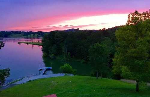 Sevierville Cabin | STAY HERE! NEW RENOVATIONS. Lake front home onsite boat launch and dock!