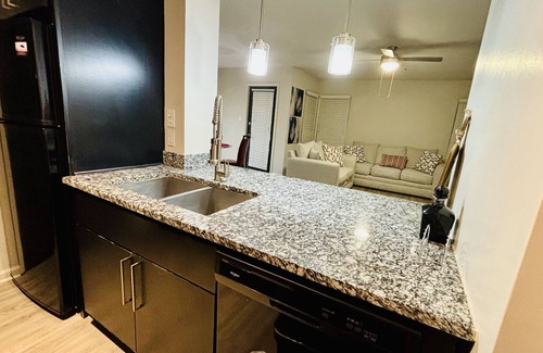 Atlanta Apartment | Stay with Jenny; bedroom and bath at Chamblee-Mercer University