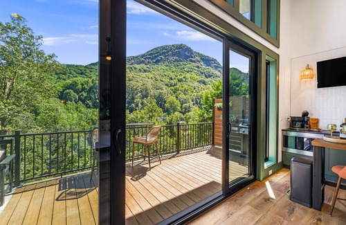 Chimney Rock Cabin | StayInOurSpace- Romantic getaway with views, walk to downtown, Hot tub, fire pit