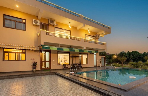 Faridabad Villa | Stayvista at Asante Farms With Pool in Mangar