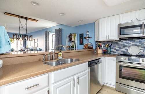 Townsend Condo | Step from the patio into the Little River. Walking distance to AWESOME!