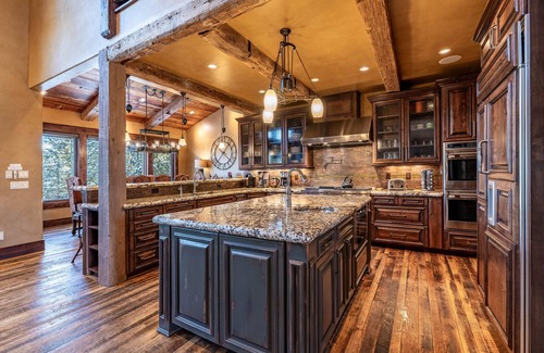 Four O'Clock House | Step out to the ski run, your hot tub or the sauna