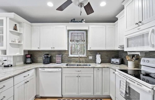 Holmes Beach House | Steps from Beach, Heated Pool & Tropical Views