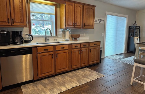 Boyne City House | Steps from Lake Charlevoix with great views. Pool & beach access for a fee.