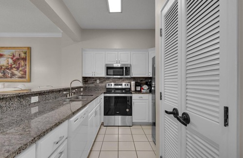 Four Mile Village Condo | Steps from the beach! Pool, Pickleball, and Tennis Courts!