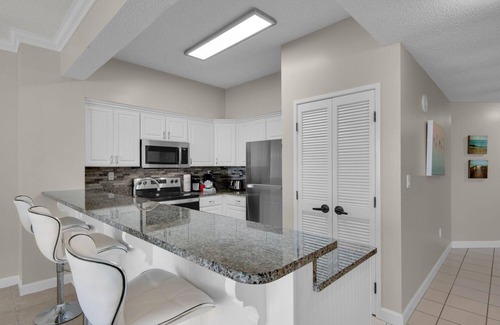 Four Mile Village Condo | Steps from the beach! Pool, Pickleball, and Tennis Courts!