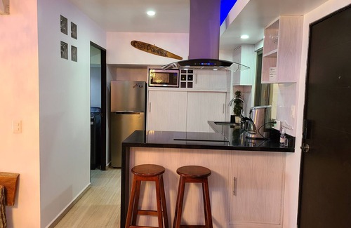 Luis Donaldo Colosio House | Steps from the beach 3-bedroom plus loft bedroom townhome, WiFi, AC & roof top.
