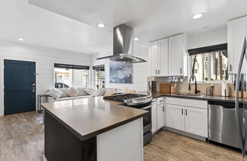 Newport Center Condo | Steps to Lido Village and the Marina- Heart of Lido Island, 2 Car Garage!