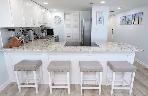 Sunnyside Condo | Steps to sand with wraparound gulf-front balcony