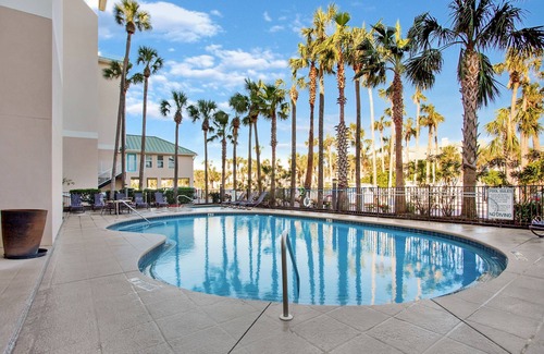 Crystal Beach Condo | STEPS TO THE BEACH! 1st floor end unit with amazing views!