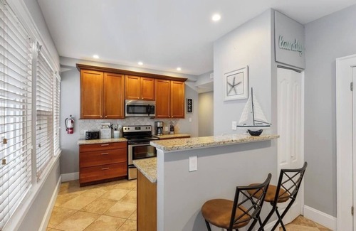 North End Condo | Steps to the Beach & Boardwalk - Pet Friendly!