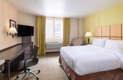 Garment District Hotel | Steps to Times Square | Full Kitchen. Pet-Friendly