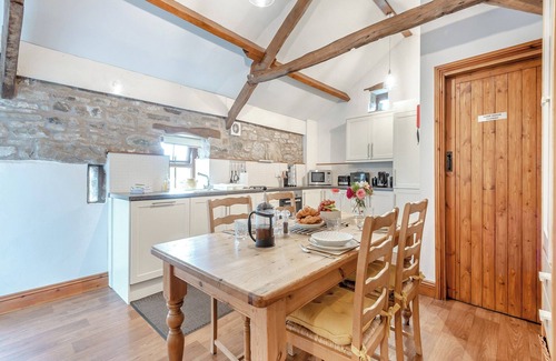Alston Cottage | Stone built barn conversion with cosy living spaces and stunning fell views.