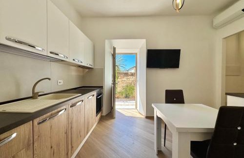 Loceri Apartment | Stone House