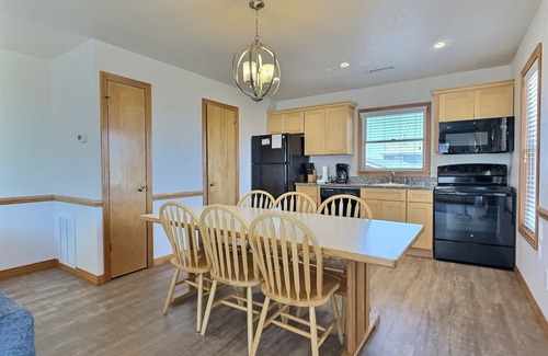 Buxton Cottage | Storm Cottage- Short Walk to Beach- Community Pool & Spa