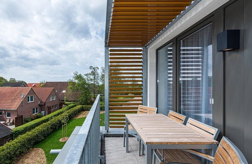 Bensersiel Apartment | Strandnahes Ferienapartment mit Balkon, Parkplatz, Schwimmbad- & Saunanutzung