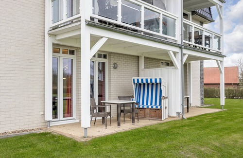 Wremen Apartment | Strandnahe, Familienfreundliche Ferienwohnung mit Sauna, Terrasse und Strandkorb