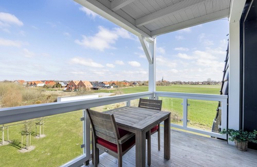 Wremen Apartment | Strandnahe Ferienwohnung mit Sauna und Schönem, Überdachten Balkon mit Ausblick