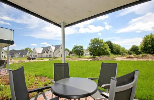 Lobbe Apartment | strandnahe FeWo mit Terrasse, gratis Nutzung vom AHOI Erlebnisbad und Sauna in Sellin - Rex Rugia FeWo 11-2