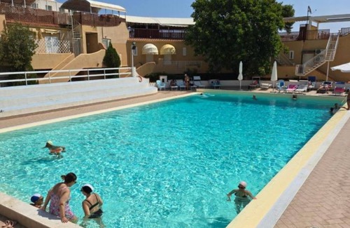 Mondello Apartment | Studio Apartment 'Flat Blu Palermo Mondello' with Shared Pool, Shared Terrace and Air Conditioning