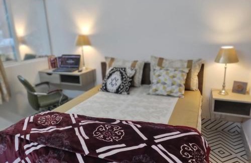 Noida Apartment | Studio Apartment with Green Lawn