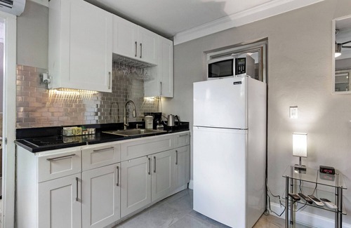 Middle River Terrace Apartment | Studio apt near Wilton Manors, fenced yard with pool, puppy friendly.