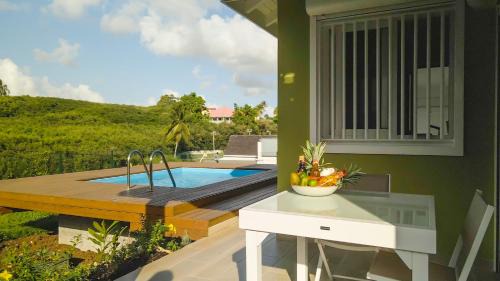 Sainte-Anne Apartment | Studio avec piscine, à 3 minutes à pied des plages