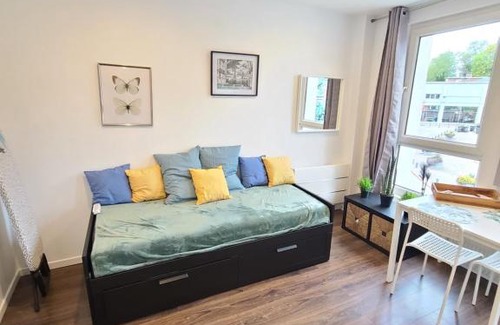 Maubeuge Apartment | Studio chaleureux et élégant en hyper centre de Maubeuge avec vue sur la porte de Mons et la place Vauban