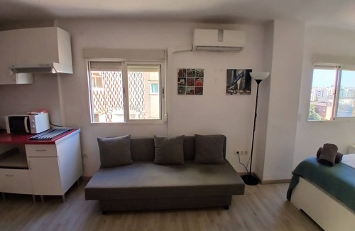 R.E.N.F.E. Apartment | Studio in front of María Zambrano Station. One step away from everything.