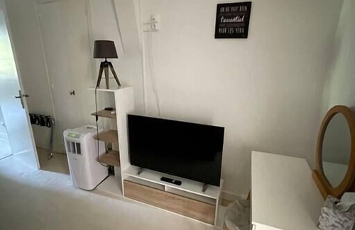 Excideuil Apartment | Studio king size bed, kitchen, living/dining room.