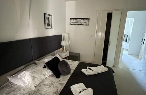 Excideuil Apartment | Studio king size bed, kitchen, living/dining room.