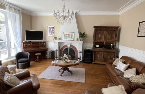 Excideuil Apartment | Studio king size bed, kitchen, living/dining room.