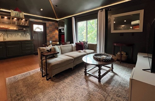 Buechel Apartment | Studio suite with secret movie room! Sleeps 4.