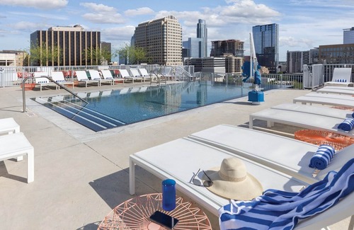 Civic District Condo | Studio unit/Austin - Full Kitchen, W/D, Rooftop Pool, & More!