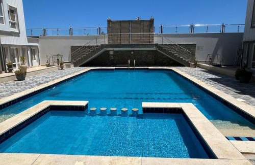 Village Road Apartment | Studio with a pool view