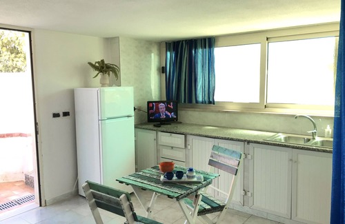 Taviano House | Studio with garden overlooking the sea