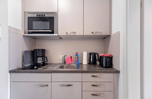 Sahlenburg Apartment | Studio 'With Great Sea View of Island' with Sea View, Private Garden and Wi-Fi