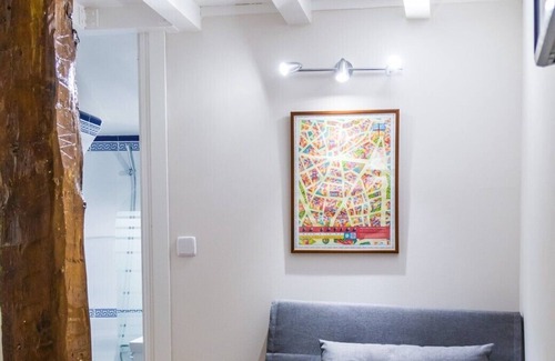 Barrio de La Latina Apartment | Studio with the bedroom in a high ceiling. Fully equipped with internet
