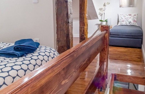 Barrio de La Latina Apartment | Studio with the bedroom in a high ceiling. Fully equipped with internet
